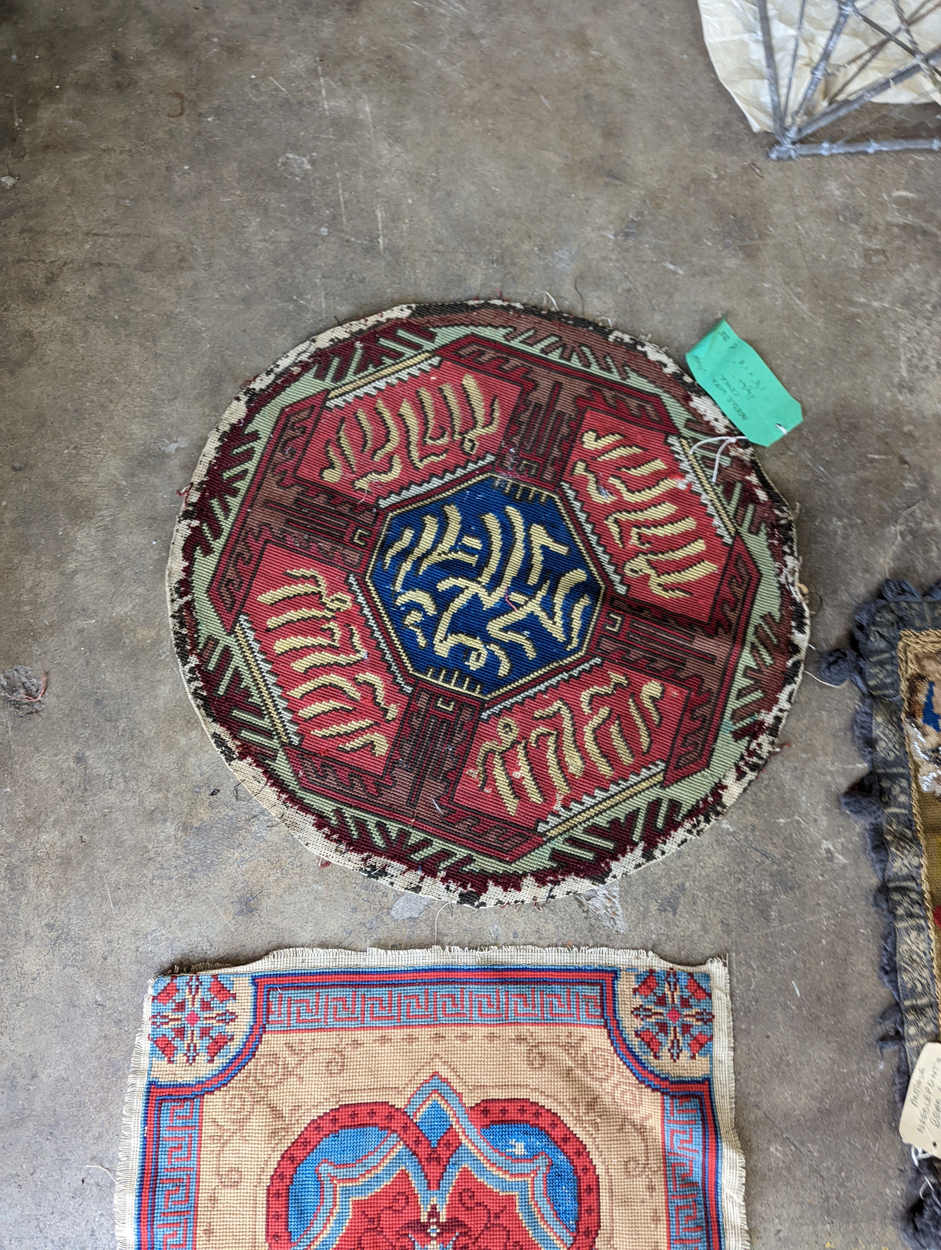 An Ottoman silk Koran cloth, three needle and bead work covers and assorted textiles